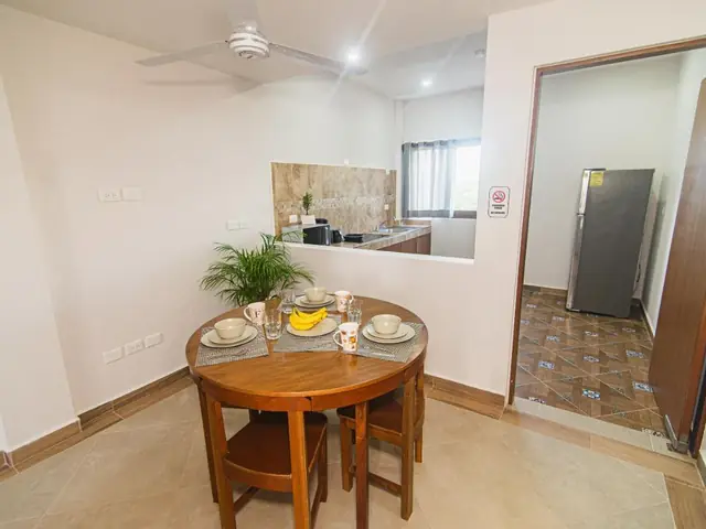 Kitchen and dining area of an apartment at Villas Najo'